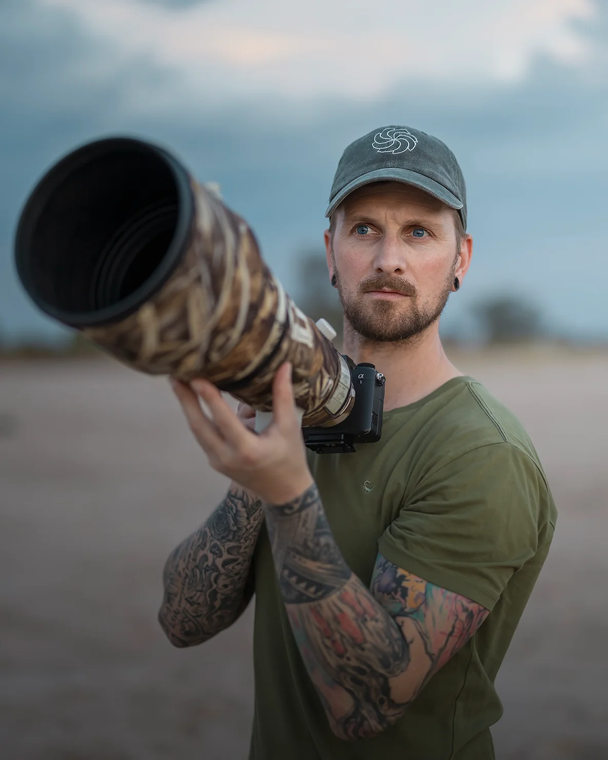 Andrew Macdonald, professional photographer, on African photo safari with telephoto lens.