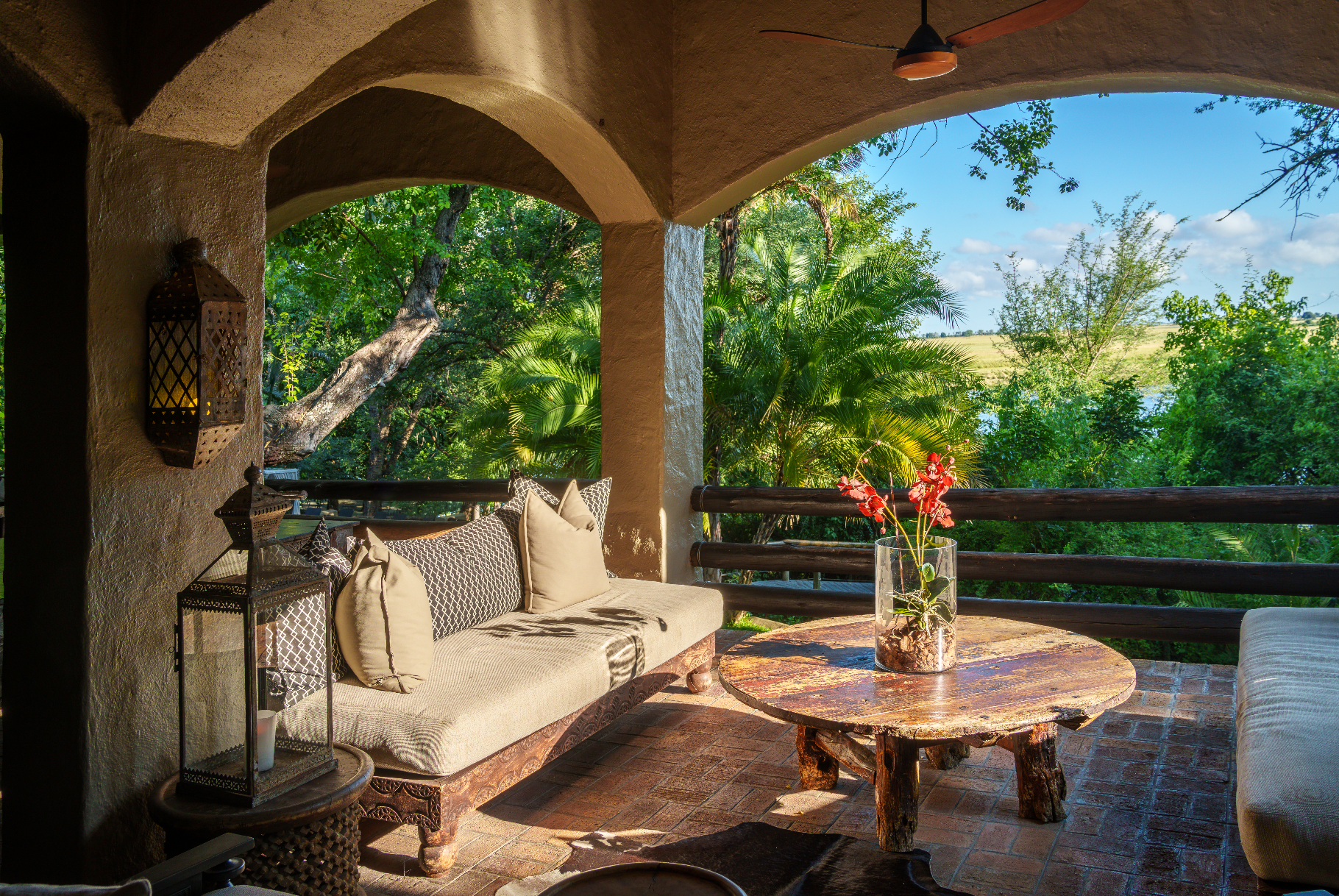 Luxury Chobe lodge veranda with river view, perfect for African safari photo tours.